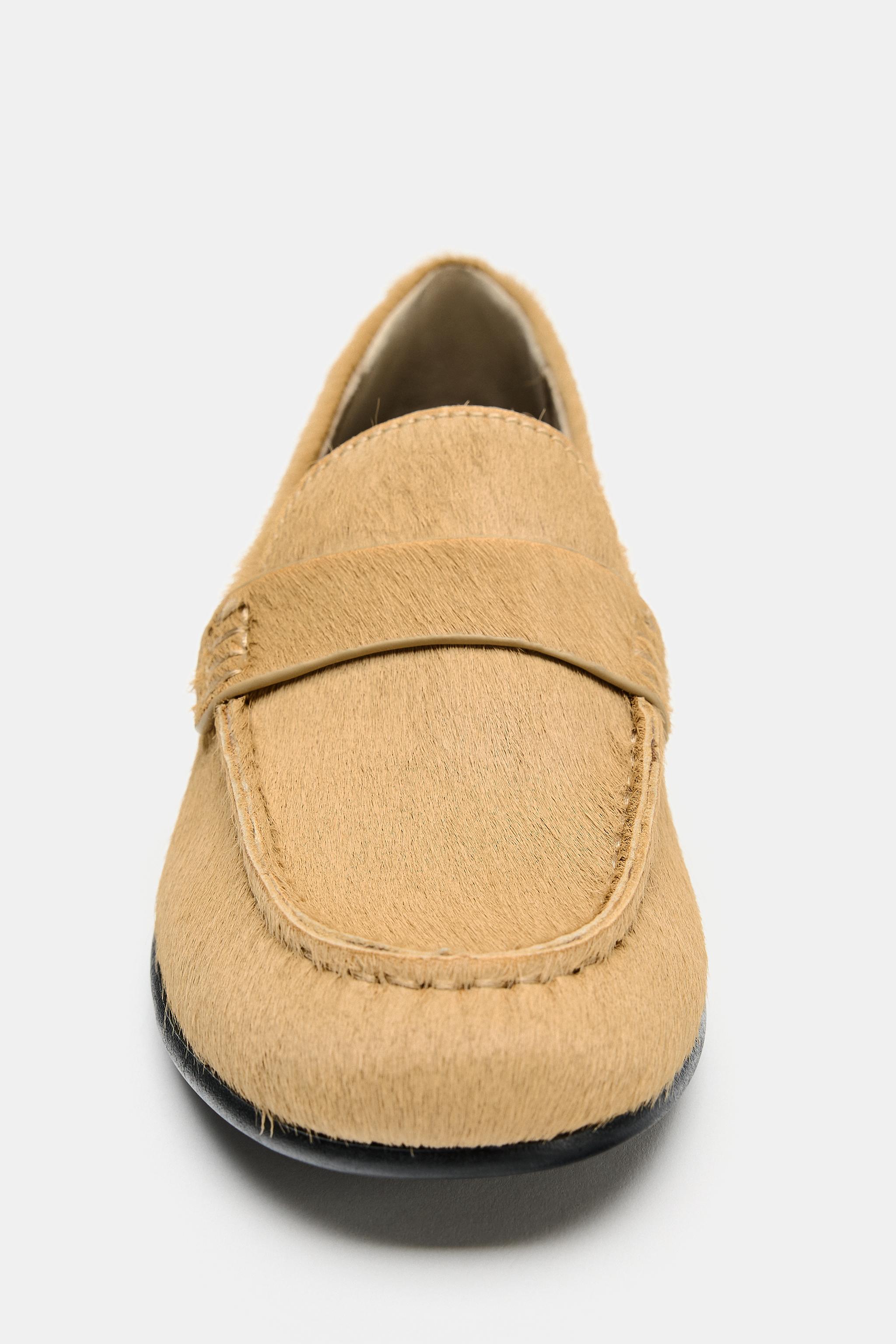 MOCASSINS EN CUIR EFFET FOURRURE